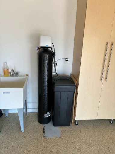 Water softener system with brine tank installed by Kabam Plumbing in Sun City Center Florida